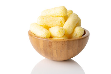corn sticks in wooden bowl isolated on a white background