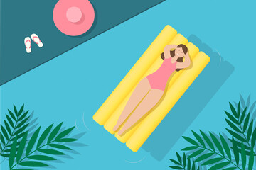 Woman on a mattress in the pool, summer