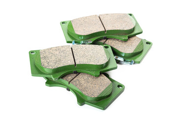 New brake pads on white background isolated object
