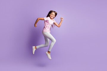 Full size profile photo of optimistic nice brunette girl run wear t-shirt isolated on pastel purple color background