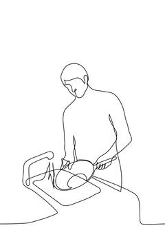 recommend clip art: man washing dishes - one line drawing vector. a householder or waiter washes a large frying pan while standing in front of the sink with the tap on
