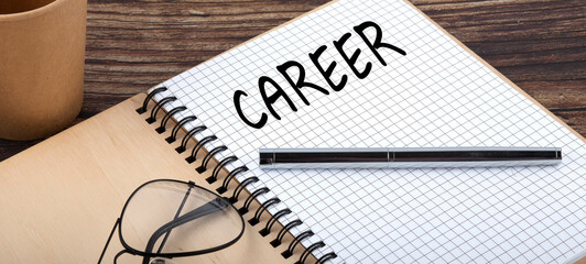 CAREER words written in an office notebook. Concept in business.