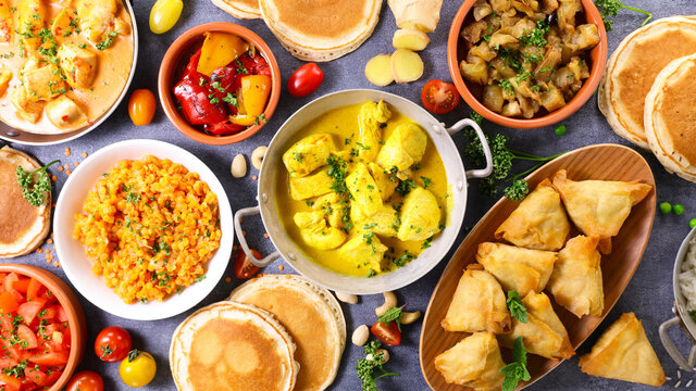 Indian Food Assortment- Naan, Curry Chicken, Samosa, Dhal Lentils