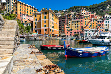 Colorful boats and houses of Camogli, Italy.