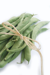 Snow pea on.white background . Pisum sativum var. saccharatum also known as mangetout isolated on white background