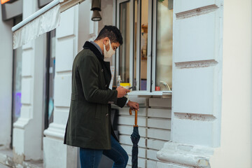 Male waiting his ordered food at the street restaurant