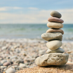 Fototapeta na wymiar Stones in a stack balanced for Zen meditation