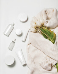 Flat lay flowers and cosmetics. Happy Mother's Day, top view stylish female and spring concept. Blog hero header background. Gift for women. Natural care cosmetics and spa