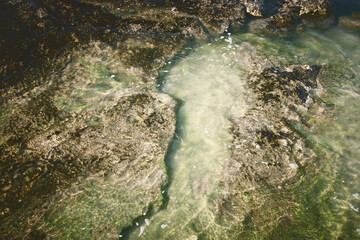 abstract background of waves of water creating swirls and ripples