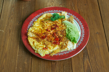 Fried Eggs with Chopped Chinese Toon Leaves