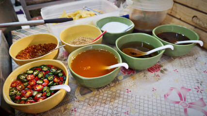 Several types of basic Thai noodle seasoning on the table 