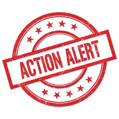 ACTION ALERT text written on red vintage round stamp.