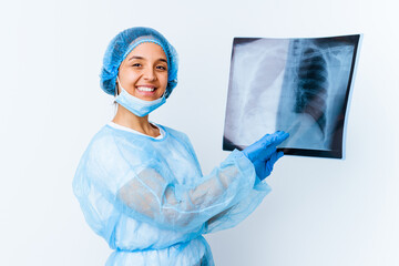 Young mixed race doctor woman holding a bone scan isolated