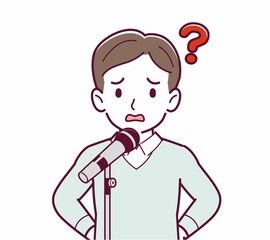 マイクで話す人