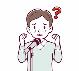 マイクで話す人