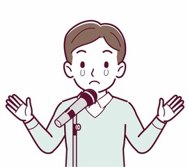 マイクで話す人