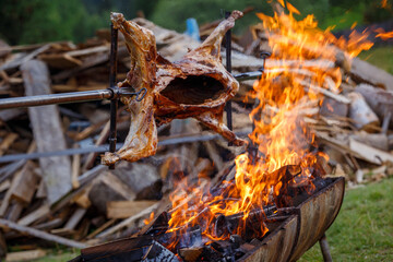 Traditional cooking mutton on fire at the festival