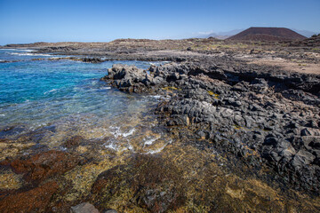 Volcanic rocks on coastline of canary island