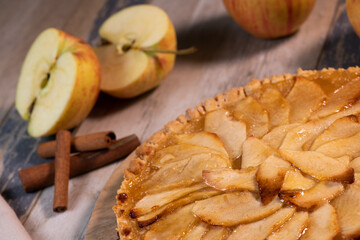 Delicious apple pie on a wooden table, from above. High quality photo