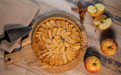 Delicious apple pie on a wooden table, from above. High quality photo