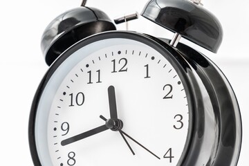Retro alarm clock with double bell isolated on white