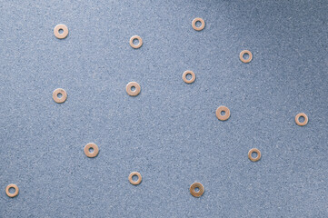 Repair. Washers for self-tapping screws on the desktop. The concept of a repair shop.