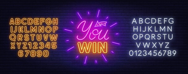You win neon sign on a brick wall background.