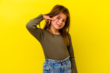 Little caucasian girl isolated on yellow background showing a mobile phone call gesture with...