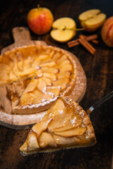 Delicious apple pie on a wooden table, from above. High quality photo