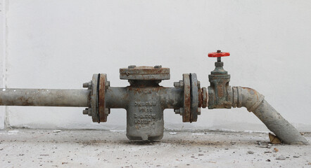 Water valve on concrete wall