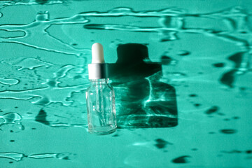 top view of glass face serum bottle