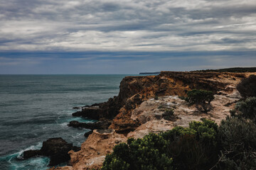 Beautiful ocean view over rocky cliffs on overcast day at Cape Nelson, Portland Victoria Australia