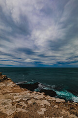 Beautiful ocean view over rocky cliffs on overcast day at Cape Nelson, Portland Victoria Australia