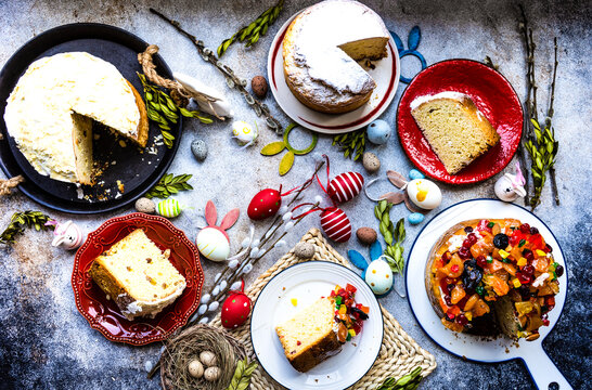Overhead view of traditional Easter cakes on a table with Easter decorations