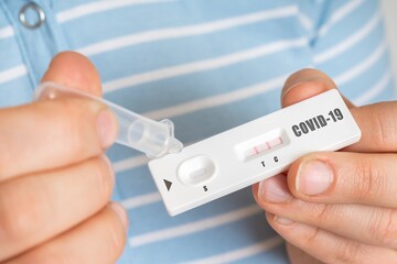 Rapid test on COVID-19 in hands of woman