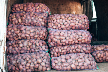 Fresh organic healthy potatoes vegetables at grocery store