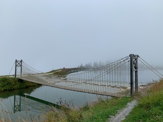 suspension bridge in the fog