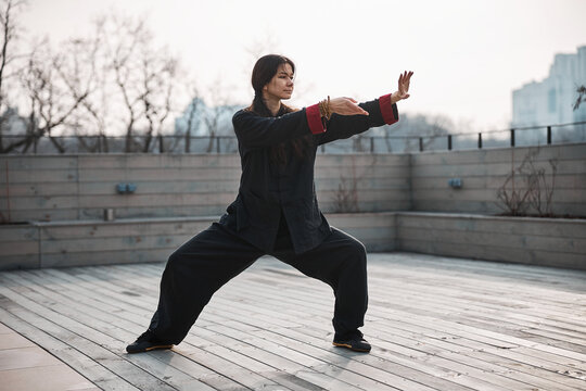 Tai chi qigong exercise with flowing hands movements