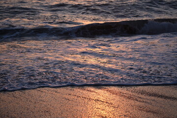 Schiuma marina al tramonto