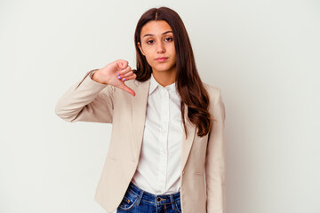 Young Indian business woman isolated on white background showing a dislike gesture, thumbs down....
