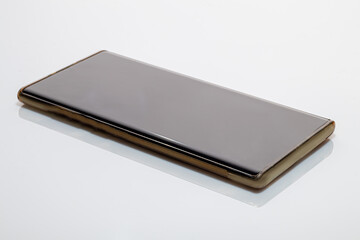 Telephone on a white background. Online learning, work from home. Coronavirus pandemic in the world.
