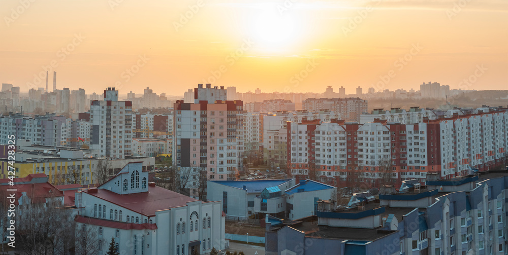 Wall mural minsk roofs of houses at sunset