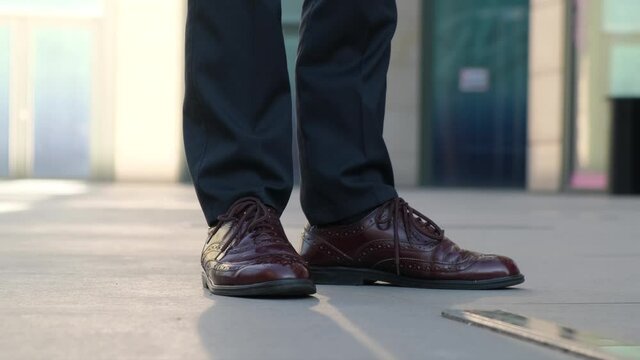 Late And Excitement Before The Meeting Concept.Man Tapping His Shoes While Waiting For Someone, Close-up