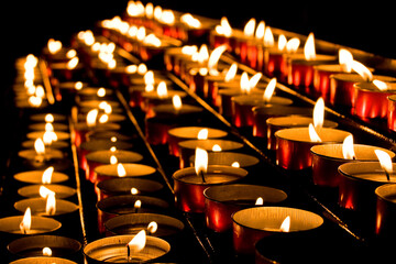 Lit candle offerings