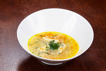 Chicken soup with vegetables and herbs