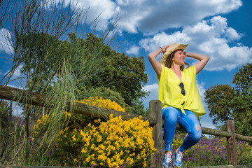 Beautiful Young Woman Enjoying A Nice Day In A Natural Park. People And Nature