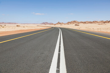 Typical road in Saudi Arabia that leads through the desert