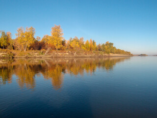 View of the autumnal bank of the Irtysh River in the Omsk Region.