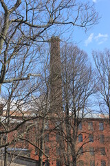 Nevskaya manufactory on the Oktyabrskaya embankment in St. Petersburg the day before the fire, pipes, towers and red brick walls