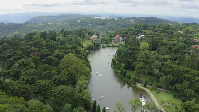 aerial image with drone mavic 2 pro from Lago Negro in Gramado Rio Grande do sul Brazil with pedal boats and trees around
